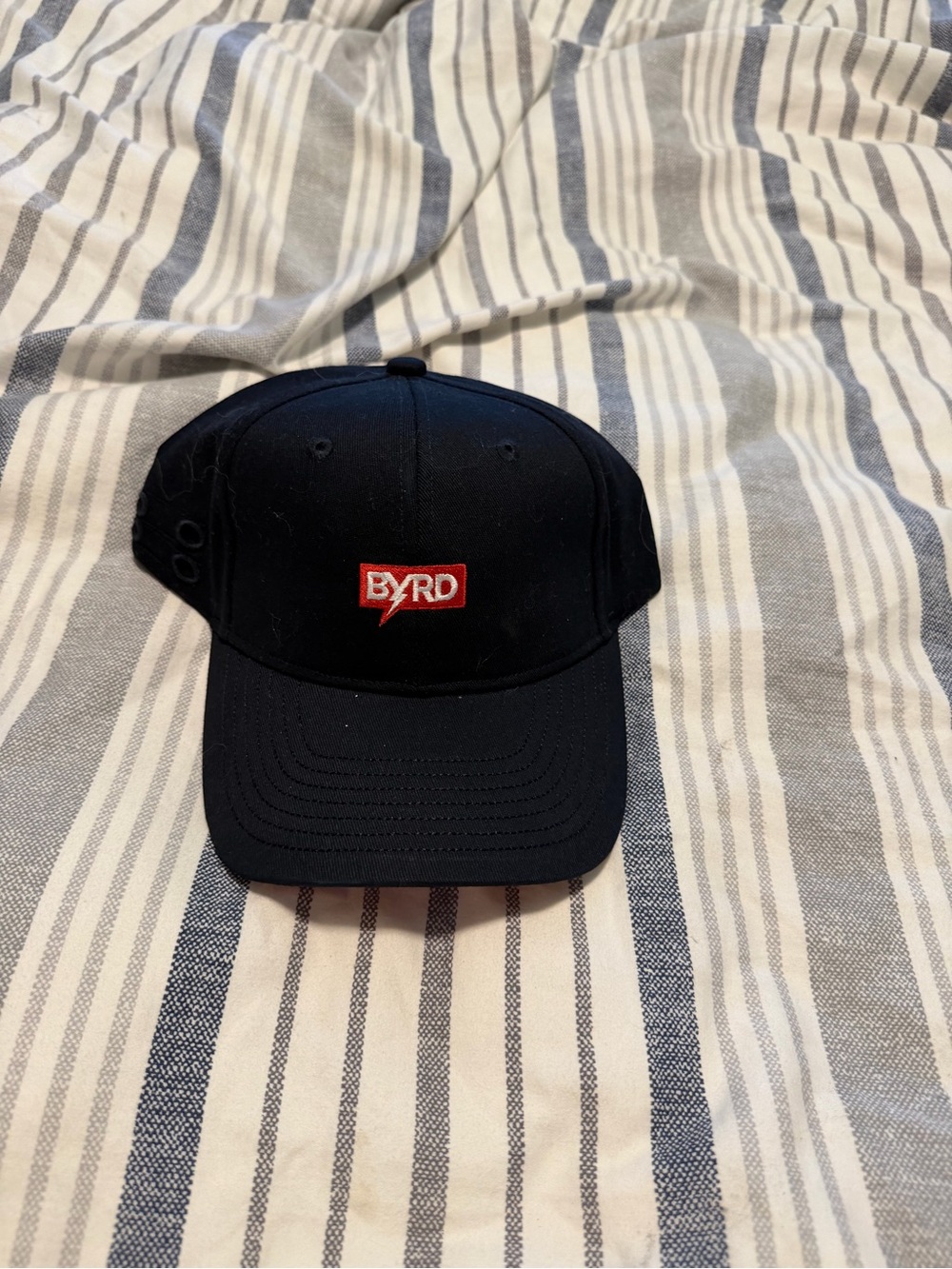BYRD Black Golf Cap with Red Logo